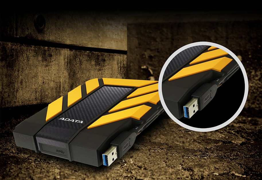 An HD710 Pro rested on the ground, with a detail view showing the USB cable being stored in the groove of the casing
